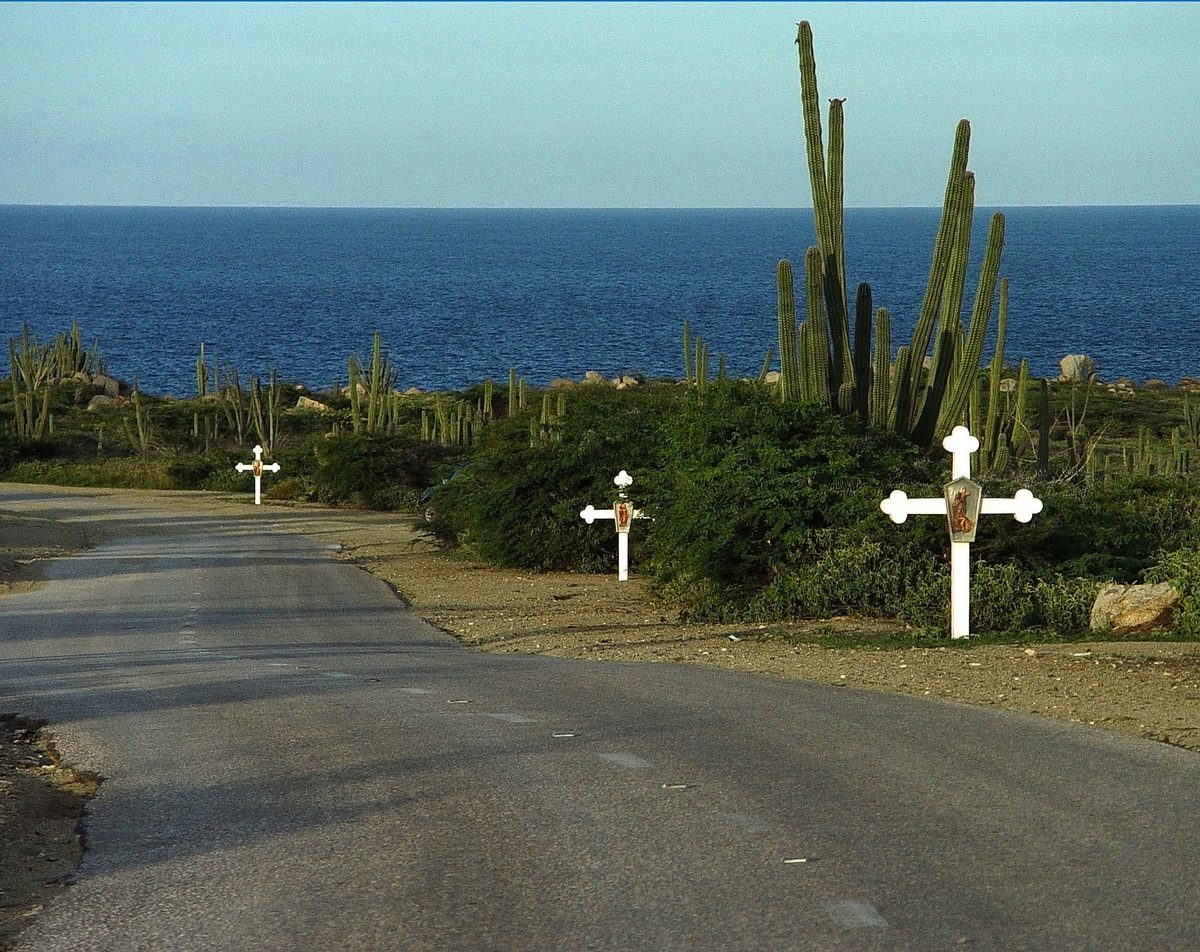 White crosses lining the winding road to Alto Vista Chapel, Aruba
