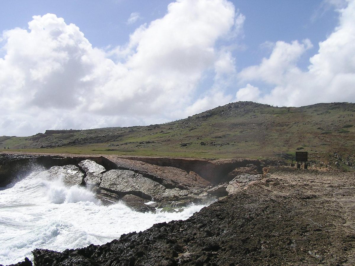 Aruba's scenic coastline, part of the island setting that makes its beachfront dining so memorable