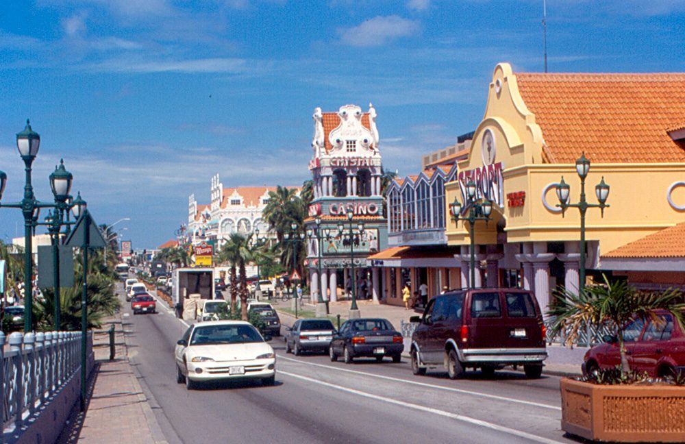A coastal boulevard in Aruba, typical of the easy paved roads you use when driving in aruba