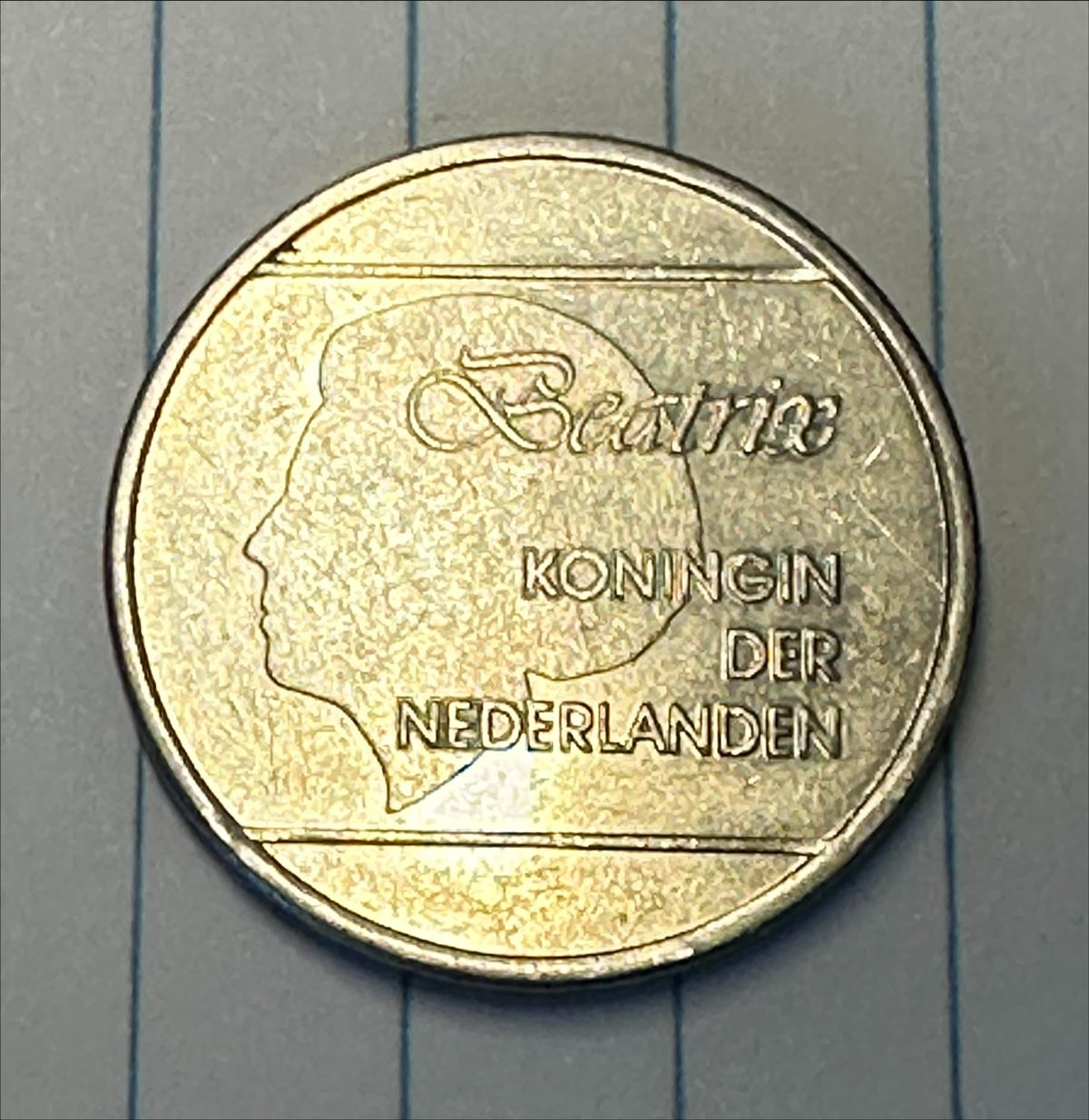 A genuine Aruban florin coin bearing Queen Beatrix, part of the island's aruba currency