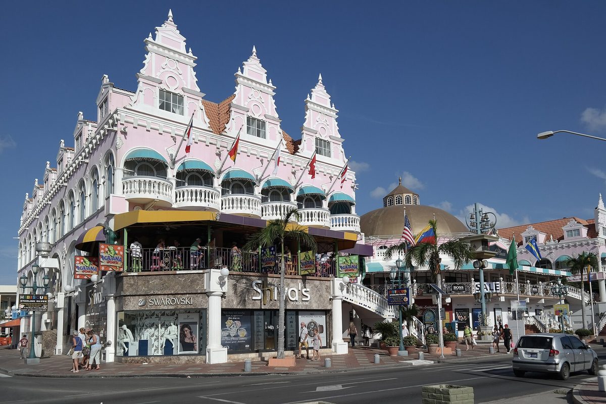 Colorful Dutch colonial buildings in Oranjestad, Aruba, an easy strolling stop for families
