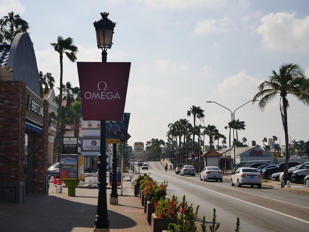 Cars and an aruba taxi moving along L.G. Smith Boulevard on the Oranjestad waterfront