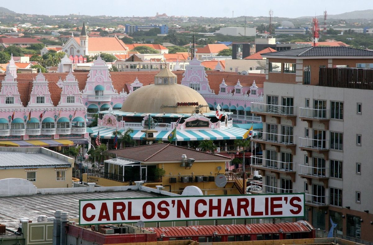 Colorful Dutch colonial buildings in downtown Oranjestad, Aruba, a hub for the best restaurants in Oranjestad