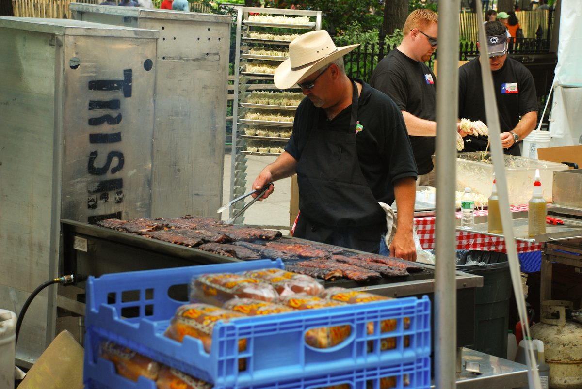 Barbecue ribs and chicken grilling at a roadside food stand in Aruba