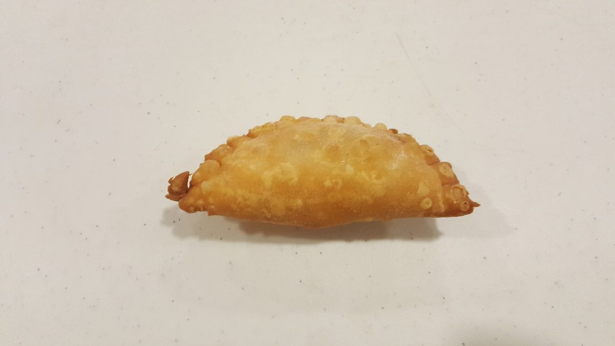 Golden fried pastechi pastries, a popular Aruban snack