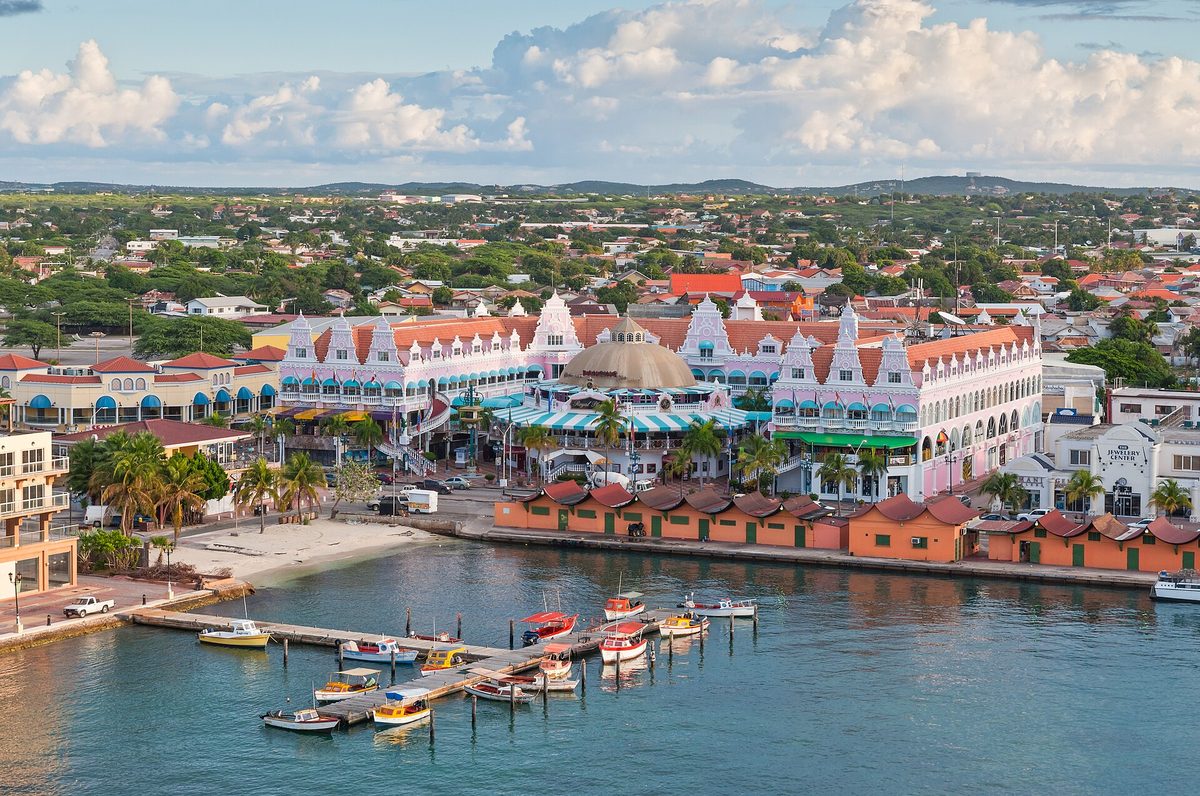 Colorful Dutch colonial buildings on the Oranjestad waterfront, Aruba's capital and the seat of its tax authority