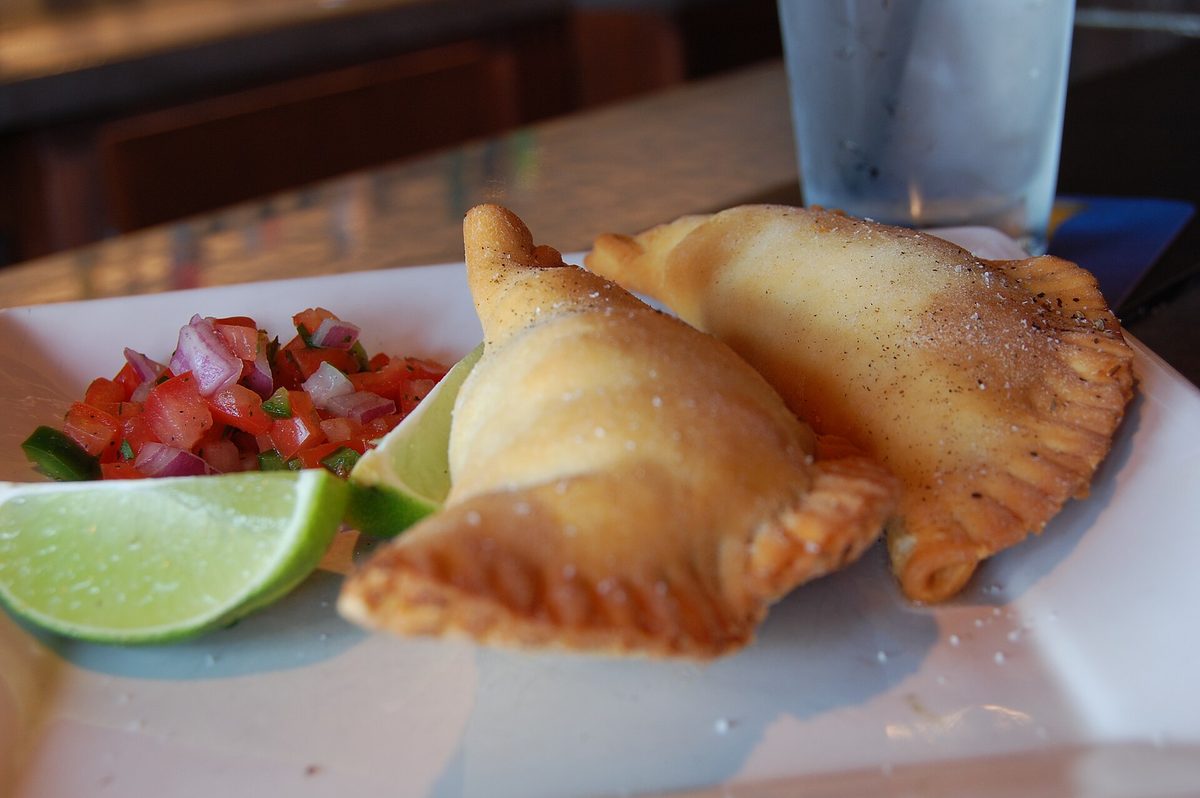 Golden deep-fried pastechi-style pastries, a cheap Aruban snack