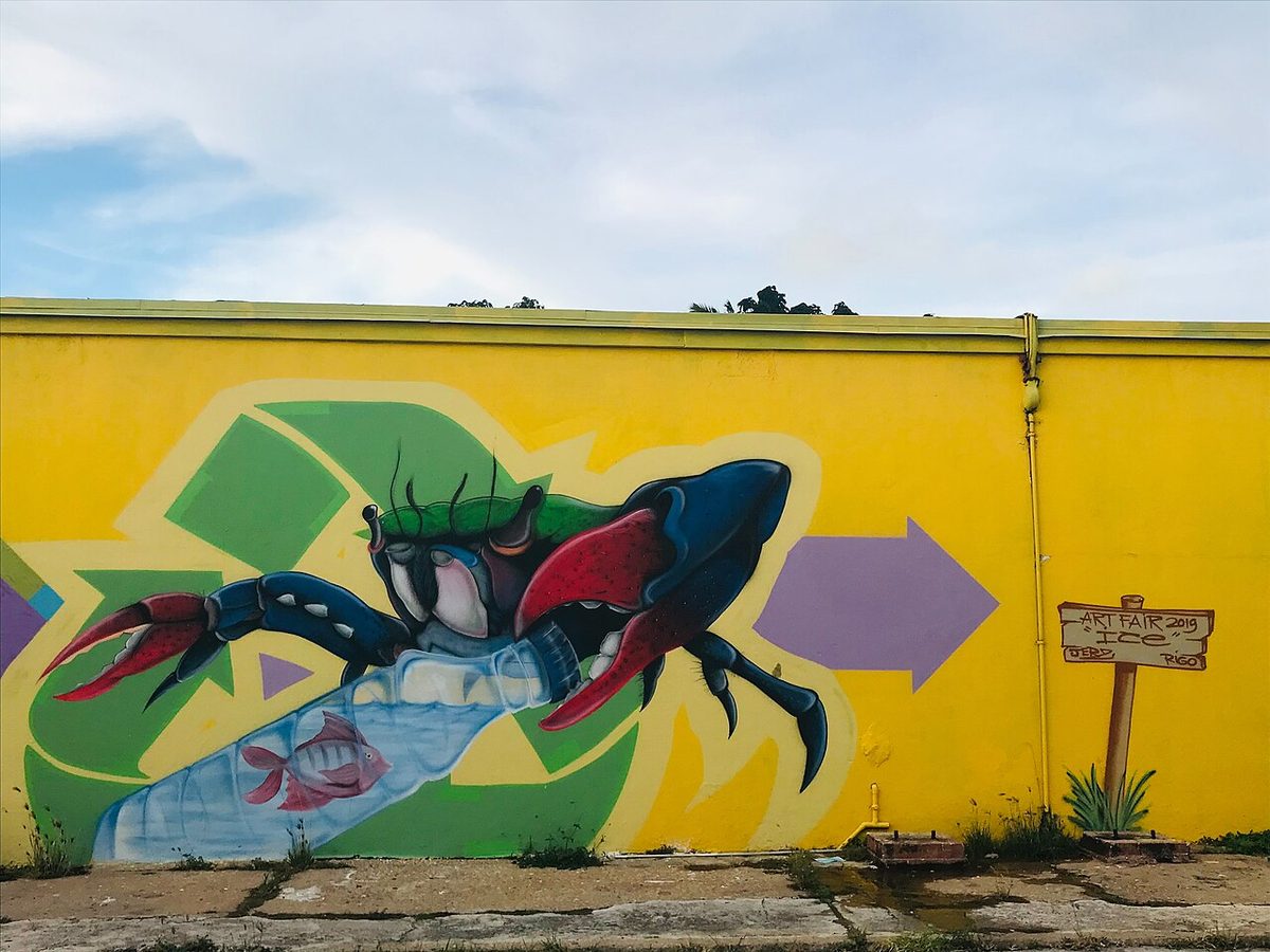 San Nicolas street art: an Aruba Art Fair crab mural on a downtown wall