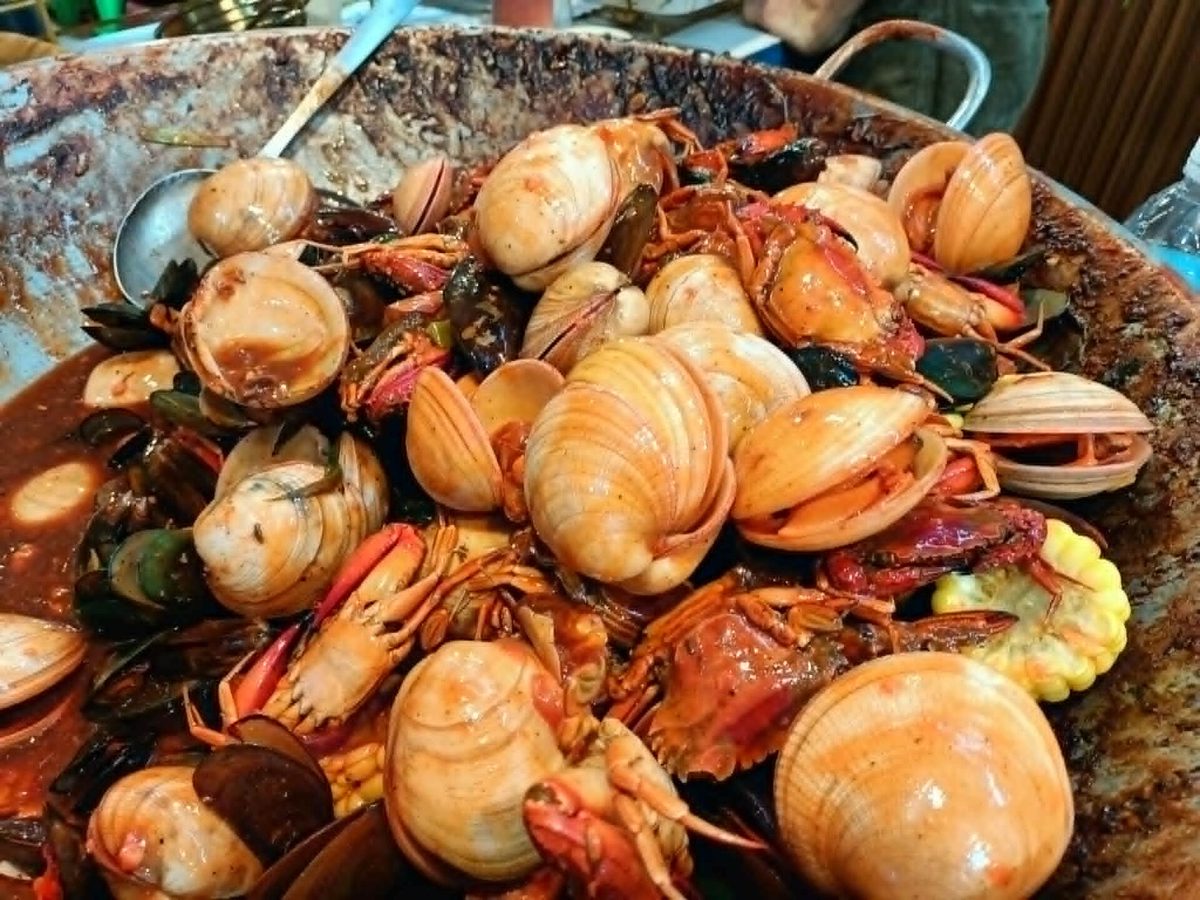 A mixed Caribbean seafood platter with clams, crab and shellfish