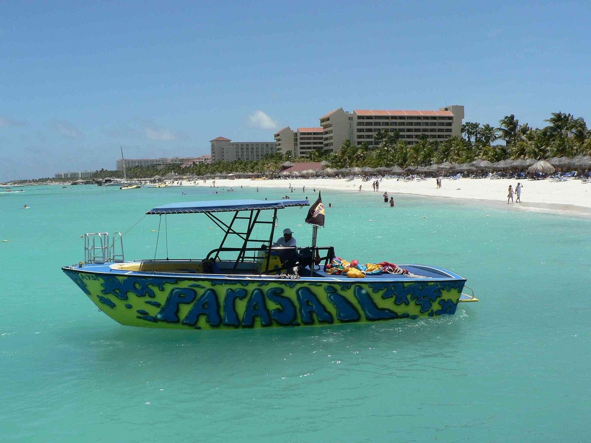 A parasailing boat waiting off Palm Beach, Aruba